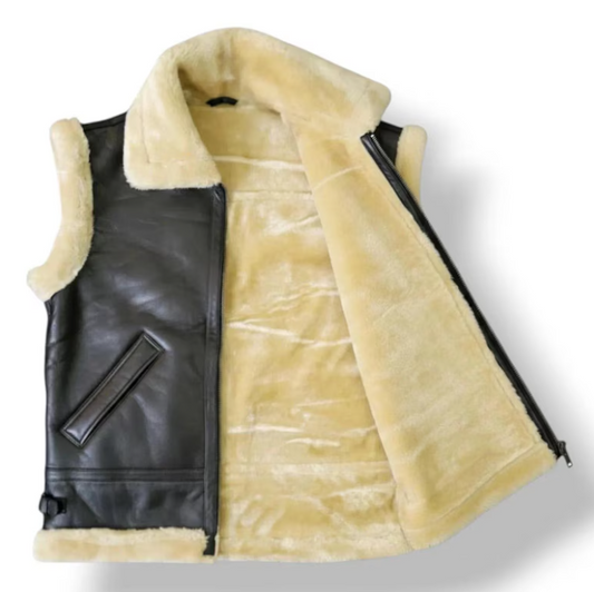 A sleeveless leather vest with a thick cream-colored shearling lining, shown open to display both the black leather exterior and the plush interior.
