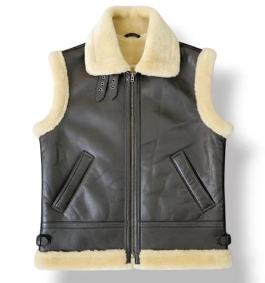 A black faux-leather vest with a cream-colored shearling-style collar, lining, and hem, shown flat against a white background.