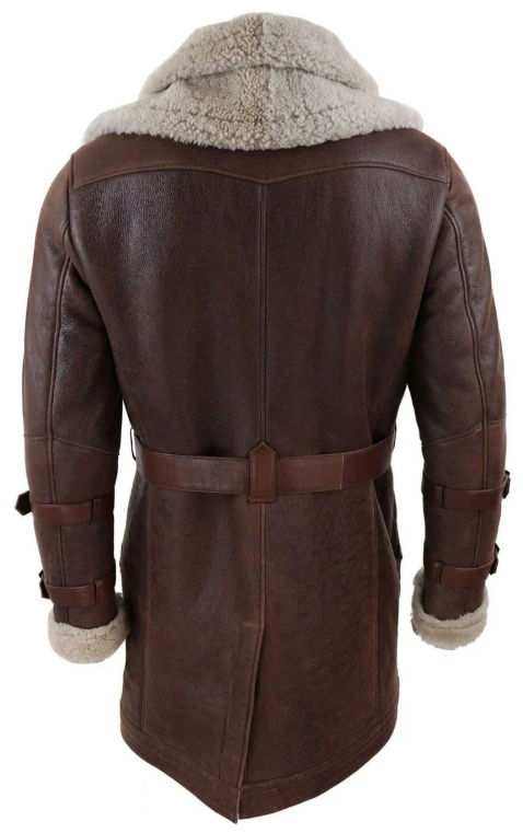 A dark brown leather shearling coat shown from the back, featuring a thick beige shearling lining on the hood and cuffs, with a matching leather belt at the waist.