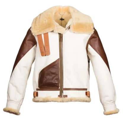 A colorblock aviator-style shearling jacket featuring cream-colored faux leather panels, dark brown leather panels, and a thick cream shearling collar and lining, shown against a plain white background.