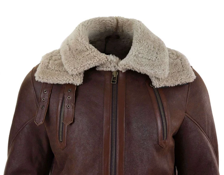 Brown leather aviator-style jacket with a thick beige shearling collar, front zipper, and zippered chest pockets, shown on a white background.