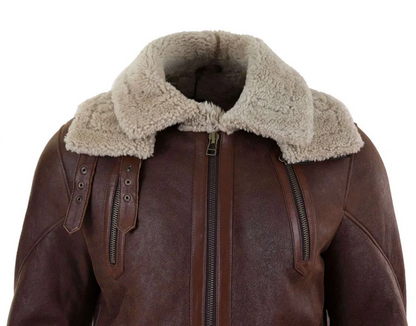 Brown leather aviator-style jacket with a thick beige shearling collar, front zipper, and zippered chest pockets, shown on a white background.