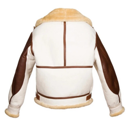 The back view of a vintage-style aviator jacket made of cream-colored shearling with brown leather panels on the sleeves and trim, featuring a light tan shearling lining.