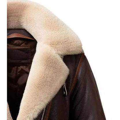 Close-up of a dark brown leather jacket with a thick, fluffy cream-colored shearling-style collar and lining.